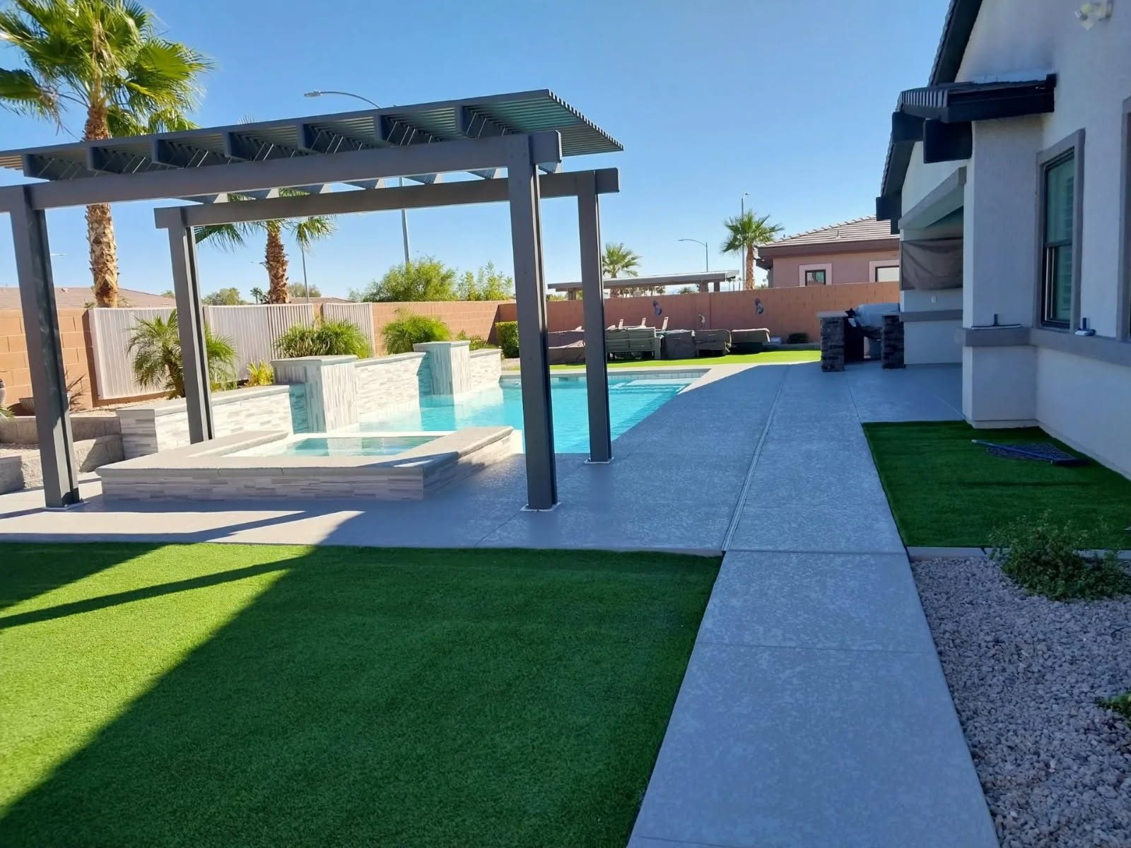 Pool deck and backyard